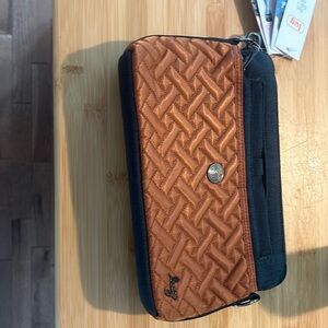 Lug handbag (pirouette model) in black & brown